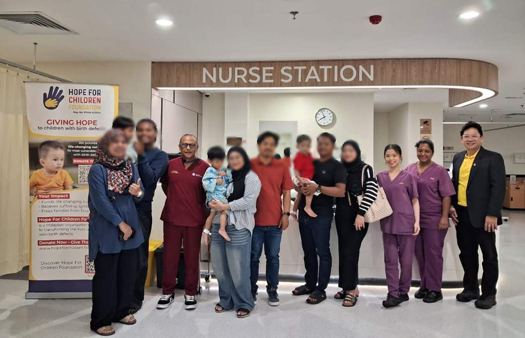 Families and medical teams at the hospital, with identities protected.